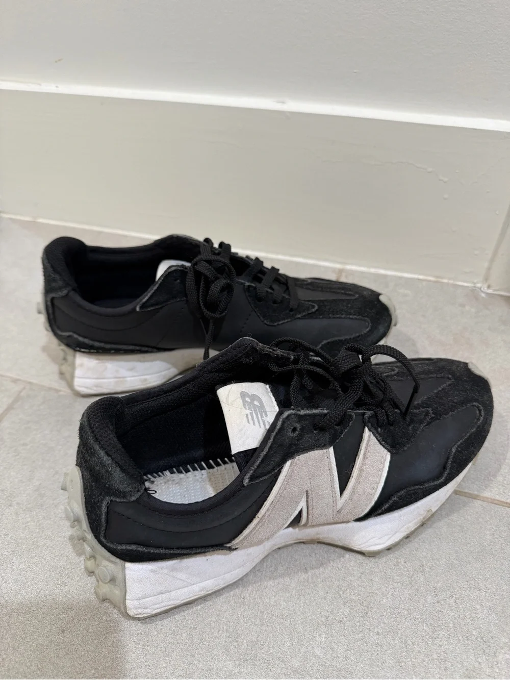 New Balance Women’s Black and White Sneakers